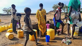 Fetching Fresh water from Desert OasisAfrican village life [upl. by Yrakaz]