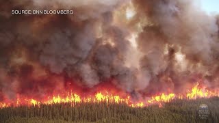 Raging Wildfires Burn Across Canada Sending Smoke Down to the US [upl. by Guy841]