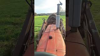 Moving old hay Farmall 806 Diesel diy farming tractor [upl. by Otsuaf]