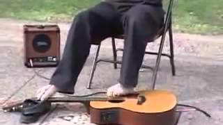 Handless Man playing guitar with his feet [upl. by Krein]