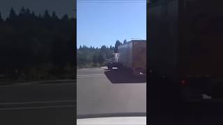 Close call as cyclist tries to pass leftturning semitruck [upl. by Erialcyram]