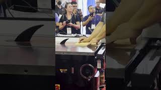 SawStop Hot Dog Test The blade locks and retracts instantly Live demo at IWF Atlanta GA 2022 [upl. by Boulanger]