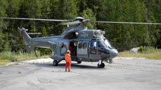 Super Puma AS332 Eagle Helicopter Albert 1er Chamonix  Lifting backhoes  mountain transport [upl. by Mays]