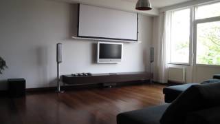 Hidden tensioned electric projection screen in living room home cinema [upl. by Donna]