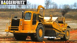 HUGE Caterpillar 637E and 637G motor scrapers are moving dirt [upl. by Kitrak]