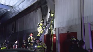 Firefighters battle 5alarm fire at selfstorage facility in Spring area [upl. by Michaella]