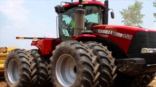 Case IH Steiger Tractors and Ashland PullType Scrapers [upl. by Ahsikahs]