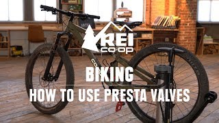 How to Pump Up a Bike Tire With Presta Valves  REI [upl. by Anwahsar451]