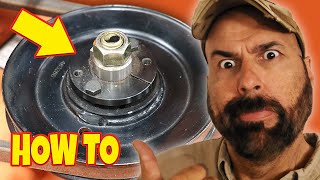 HOW TO REPLACE MOWER SPINDLE  PULLEY [upl. by Relyuhcs]