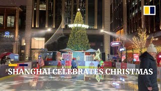 Shanghai celebrates Christmas despite sporadic Covid outbreaks [upl. by Ledba]