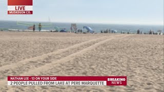 2 people pulled from Lake Michigan in water rescue [upl. by Sukramaj]