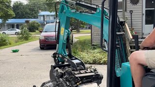 Chinese mini excavator loading suv on trailer [upl. by Gotthard]