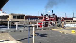 Tugboat Florida trying to free the stuck freighter Orla in a stll ice filled MacArthur Lock [upl. by Yerg]