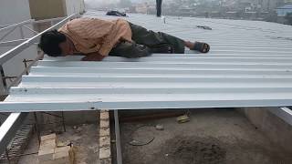 Roofing sheet fitting [upl. by Rudd735]