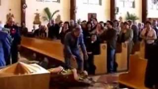 Spagna  Santo cade in chiesa durante una processione [upl. by Ttemme672]