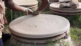 Injera mitad making near Addis Ababa Ethiopia Mogogo clay plate [upl. by Ynaffi]