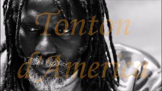 Tiken Jah Fakoly  Tonton dAmerica  Lyrics [upl. by Ursel]