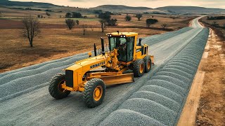 The technique of rural road construction process with a heavy motor grader pushing gravel road base [upl. by Pillyhp402]