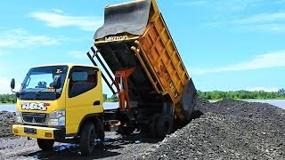 Dump Truck And Wheel Loader Excavator Spreading Sands On The Riverside Furukawa [upl. by Wolfe]