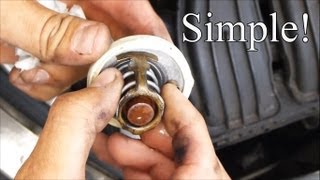 How to Change a Thermostat in a PT Cruiser [upl. by Lemal]