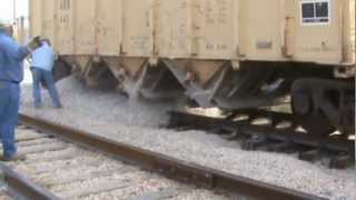 Application of Railroad Ballast from a Hopper railcar [upl. by Eissirc]