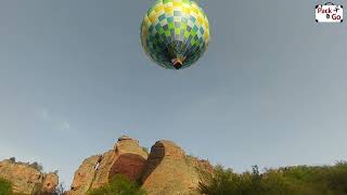 Hot air balloons flying away in Belogradchik in the morning [upl. by Madelle417]