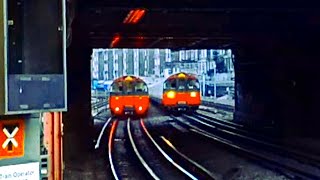 🚇 1973 TUBE STOCK CROSSING at BARONS COURT London Undergorund [upl. by Jeanine755]