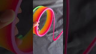 Uncoiling giant rainbow slinky shorts slinky asmr [upl. by Argus]