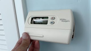 How to remove the cover on a White and Rodgers thermostat [upl. by Mollee951]