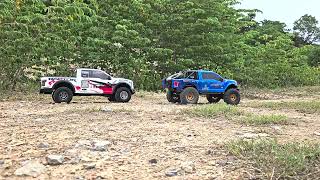 Dual Traction Hobby 18 Ford Raptor F150 Cragsman vs Ford Raptor F150 White body off road [upl. by Elburr307]