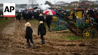 Fundraising auctions at Pennsylvanias annual Amish mud sale [upl. by Aivull]