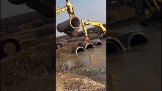 Skilled excavator laying water pipe [upl. by Alleuol]