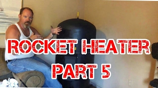 Rocket Heater Wood Stove Installation Part 5 The First Burn Indoors [upl. by Dorahs124]