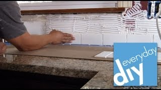 How to Install a Tile Backsplash Part 1  Buildipedia DIY [upl. by Ainahtan]