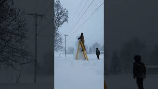 Father and son spend a fun snow day building a 9foottall snowman [upl. by Cence98]