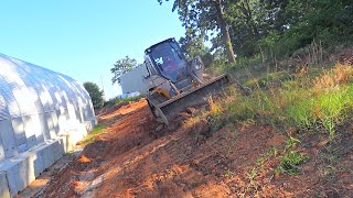 Grading across a Side Hill with a Skid Steer [upl. by Kcirddet]