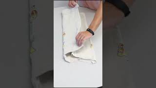 How to roll a T Shirt compact for packing Military Roll or Ranger roll Travel Tips [upl. by Eisnyl]