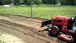 Kubota b2620 pushing dirt [upl. by Etnuhs]