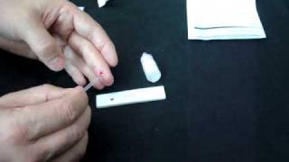 HIV test kit  demonstration of an HIV home test for HIV 1amp2 [upl. by Aleafar]