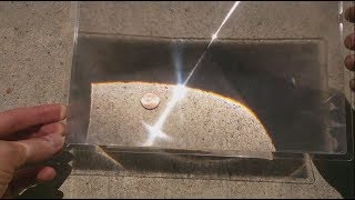 Melt a Penny with the Sun and a Fresnel Lens  magnifying glass [upl. by Refiffej]