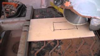 Cutting an Outlet Hole Into a Tile [upl. by Mauer797]