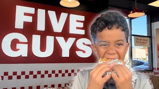 Kid Tries Five Guys Burger and Fries [upl. by Ahsikram994]