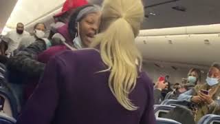 Woman kicked off plane after hitting flight attendant [upl. by Franky]