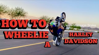 how to wheelie a Harley Davidson with Ryan Kruesi [upl. by Naillil905]