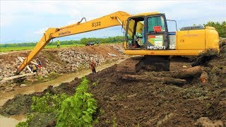 Long Reach Excavator And Dump Trucks Working On River Bank Construction [upl. by Lorita90]