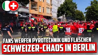 Schweizer Fans werfen Pyrotechnik und Flaschen in Berlin Schweizer vs Italien [upl. by Akered]