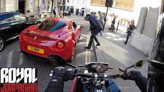 Alfa Romeo 4C vs Husqvarna Nuda 900R  Rev Battle [upl. by Akemeuwkuhc]