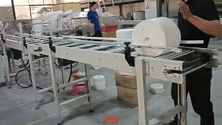 Automatic label application maxi roll tissue paper shrink packing machine factory maxirollmachine [upl. by Nnaaras]