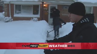 Police Help Clear Snow From Outside Seniors Homes In Merrionette Park [upl. by Suirtimed]