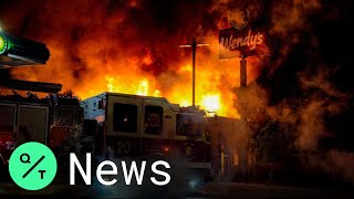 Protesters Set Fire to Wendys DriveThru Where Rayshard Brooks Was Shot and Killed By Police [upl. by Heywood141]